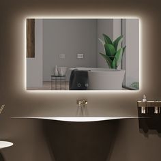 a bathroom with a sink, mirror and bathtub in it's center area