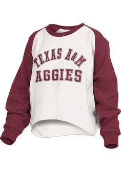 Make your way to the big game in this Texas A&M AggiesWomens White Lotus Crew Sweatshirt! This Aggies Long Sleeve Sweatshirt features a chenille applique team name on center front. Stay warm and comfortable with this Womens Texas A&M Aggies Crew Sweatshirt. Waist length, Contrasting sleeves, Contrasting neckline, Curved hem, Soft to touch, 60% COTTON / 40% POLYESTER, 4 Collegiate Fall Fan Gear Tops, Team-colored Tops With Ribbed Cuffs For Fan Gear, White Varsity Top With Ribbed Cuffs, Fan Gear Tops With Ribbed Cuffs, Team-colored Tops For Sports Events In Fall, Varsity Tops For Sports Events In Fall, Varsity Tops For Fall Sports Events, Collegiate Tops For Sports Events, Fan Apparel Tops With Ribbed Cuffs For Sports Events