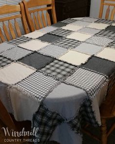 a dining room table with a checkered table cloth