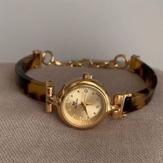 About this itemThis irregular resin small round face bracelet watch, whether for casual wear or special occasions, its unique style ensures you&apos;ll make a memorable impression. Elevate your accessory collection with this exceptional watch that beautifully blends art and function.✅ Materials: 	Case Material: Glass, Stainless Steel, Copper 	Band Material: Stainless Steel 	(The Green Part Is Made Of Resin)✅ Dimensions 	Case Height: 8 mm 	Case Width: 20 mm 	Case Length: 20 mm 	Band width:6 mm✅ AdjustableFor watches with stainless steel links, we provide a free adjustment tool with your purchase. You can easily remove links to adjust the band length for a perfect fit.✅ Delivery:We offer worldwide shipping with tracking included. You can track directly from your order. To ensure timely deliv List Aesthetic, Unique Watches, Moon Watch, Irregular Shapes, Xmas List, Jewelry Essentials, Jewelry Inspo, Intricate Patterns, Big Deal