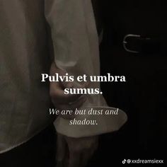 two people holding hands with the caption pulvis et umbra sumus we are but just and shadow