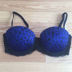 Sexy Blue Leopard Print Bra With Black Lace Band. Push-Up For Extra Cleavage. Removable Straps To Wear Strapless. Blue Stretch Bra With Removable Pads, Blue Party Bra With Underwire, Blue Padded Bra For Party, Blue Party Bra With Padded Cups, Blue Padded Party Bra, Blue Fitted Bra With Removable Pads, Fitted Blue Bra With Removable Pads, Blue Fitted Strapless Bra, Leopard Print Bra