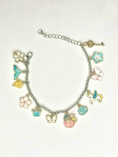 Spring/summer charm bracelet. Light pink and blue with pops of yellow Charm Bracelets, Favorite Jewelry, Light Pink, Jewelry Bracelets, Etsy Accessories, Handmade Items, Bathing Beauties, Charms, Charm Bracelet