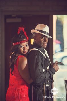 a man and woman dressed up in costumes