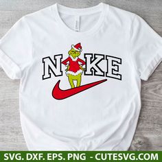 the grinch is wearing a santa hat and running on a nike t - shirt