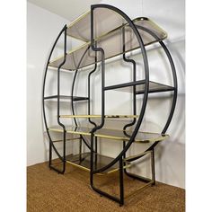 a black and gold metal shelf with shelves