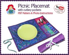 the picnic placemat with cutlery pockets is purple and green