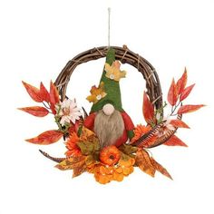 a wreath with a gnome sitting on top of it