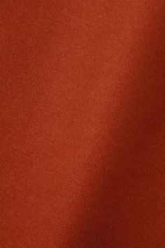 a close up image of an orange fabric