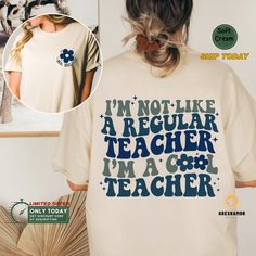 "🌟 Final Call: Christmas Orders End Dec 7! 🎄 🔥 Use code SAVEMORE at checkout for 30% OFF with 2+ item order. Don't miss out! Looking for the perfect gift for your favorite teacher? Look no further than our \"I'm Not Like A Regular Teacher, I'm A Cool Teacher\" shirt! This funny and cute shirt is the perfect way to show your appreciation for your cool teacher. It's a great back-to-school shirt for kindergarten teachers, new teachers, and anyone in the cool teachers club. With a variety of styles to choose from, including t-shirts and sweatshirts, this teacher life shirt is sure to make a great teacher gift that your favorite educator will love. 📏 SHIRT MATERIAL * Super soft, light and comfortable, with the right amount of stretchy makes these short sleeve t-shirts a perfect daily garmen Casual Tops With Funny Print For Teacher Appreciation, Retro Cotton Slogan Shirt, Cotton Shirt With Funny Print For Teacher Appreciation, Retro Cotton Shirt With Funny Text, Fun Teacher Outfits Elementary, Teacher Engagement, Fun Teacher Outfits, Teacher Appreciation Diy, Cool Teacher