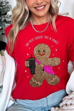 Show off your sweet and sparkly side this holiday season with this 'Out Here Lookin' Like a Snack' Christmas graphic tee. This eye-catching unisex graphic tee features a glittery gingerbread design that adds a touch of whimsy without the mess of real glitter. Crafted from comfy blending materials, it provides the perfect balance of comfort and breathability. This tee is a fun, festive addition to your holiday wardrobe or a unique gift for someone special. Made with care in Nicaragua, it's design Snack Christmas, Gingerbread Design, Snap Jewelry Charms, Concealed Carry Handbags, Essential Oil Accessories, Christmas Graphic, Gingerbread Christmas, Plus Swimwear, Snap Jewelry