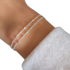 Dainty Adjustable Silver Chain Bracelet, Adjustable Dainty Sterling Silver Hypoallergenic Bracelet, Adjustable Hypoallergenic Dainty Sterling Silver Bracelet, Dainty Adjustable White Gold Bracelet, Delicate Sterling Silver Bracelet With Adjustable Chain, Adjustable Minimalist Satellite Chain Bracelet, Dainty Silver Delicate Chain Bracelet, Dainty Sterling Silver Chain Bracelet, Dainty Sterling Silver Bracelet With Delicate Chain