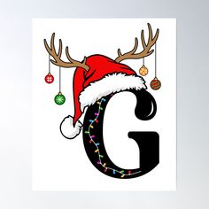 the letter g is decorated with christmas lights and reindeer antlers on it's head