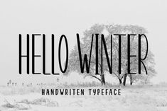 the words hello winter written in black and white