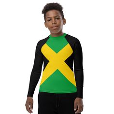 Get a colorful and soft rash guard that's the right fit for any active teen who loves water and contact sports. Its longer body and sleeves will protect the skin, while the fitted design means it won't get in the way even during the most intense activities. * 82% polyester, 18% spandex * 6.78 oz/yd² (230g/m weight may vary by 5% * 38-40 UPF * Very soft four-way stretch fabric that stretches and recovers on the cross and lengthwise grains * Fitted design * Comfortable longer body and sleeves * Ov Jamaican Clothing, Long Sleeve Swimwear, Flat Seam, Rash Guard, Kids Tops, Jamaica, Sun Protection, Tankini, Stretch Fabric