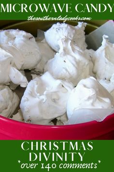 a red bowl filled with marshmallows on top of a green and white background