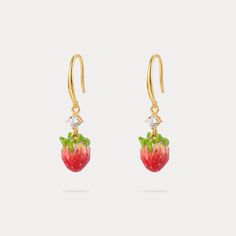 Indulge in the sweetness of these luscious strawberry earrings. Featuring a delicate enamel finish and shimmering cubic zirconia, these cheerful earrings brighten up your look with a touch of nature-inspired style. Perfect for adding a pop of freshness and fashion to your summer vibes! DETAILS Plating: 18K Gold Materials: 18K Gold on Brass, Enamel, Cubic Zirconia Size: 1.39 "*0.39"(3.4c m*1cm) Weight: 6.4g Strawberry Earrings, Fruit Necklace, Everyday Wear Jewelry, Astrology Jewelry, Astrology Necklace, Moon And Star Ring, Moon And Star Earrings, Fruit Jewelry, Nature Earrings