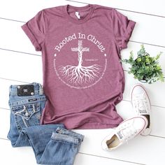 "This comfortable t-shirt will be your and your friends' favorite! Be simple, be different!! ✔ MATERIALS & PRODUCT DETAILS The T-Shirts is unisex. * We use name brand Bella Canvas. * 100% preshrunk ring spun cotton * *Athletic Heather: 90/10 cotton/polyester * *Red and Kelly: %100 cotton * *Heather colors: 52/48 cotton/ polyester (All type shirts are very soft) ✔ SIZE * This is a Unisex sized shirt. Please refer to the size charts for measurements. The measurements chart is the best and only way Inspirational Short Sleeve Shirt With Relaxed Fit, Inspirational Short Sleeve Relaxed Fit Shirt, Rooted In Christ, Christ Shirts, Measurements Chart, Cross Shirt, Cross Shirts, Chapel Hill Nc, Jesus Cross