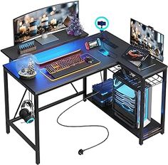 a computer desk with two monitors and a keyboard on it, connected to a mouse pad