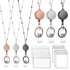 an assortment of necklaces with different shapes and sizes, including one for the camera