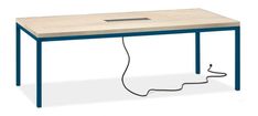 a computer desk with an electrical cord plugged into the top and below it, on a white background