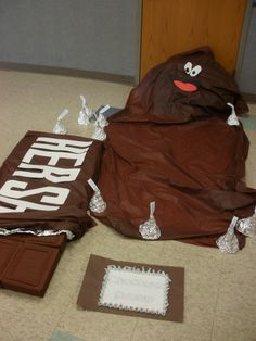 a chocolate covered bag sitting on top of a floor