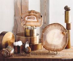 an assortment of decorative items on a wooden table