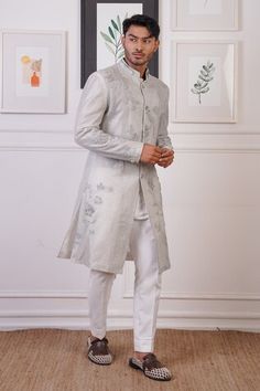 Grey long sherwani with tonal floral embroidery and zardozi highlights. Paired with a pant. - Aza Fashions Formal Sherwani With Floral Embroidery For Diwali, Floral Embroidered Sherwani For Reception During Eid, Floral Embroidered Sherwani For Diwali, Diwali Sherwani With Floral Embroidery, Diwali Floral Embroidered Sherwani For Reception, Diwali Reception Sherwani With Floral Embroidery, Bollywood Sherwani With Floral Embroidery For Formal Occasions, Bollywood Style Floral Embroidered Sherwani For Formal Occasions, Bollywood Style Floral Sherwani For Formal Occasions