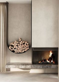 a fire place with logs in the middle