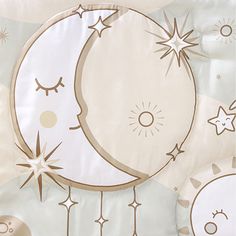 an image of a moon and stars on the bed sheet set for baby's room