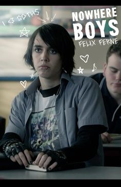 two people sitting at a table in front of a computer screen with the words nowhere boys written on it