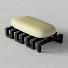 a white and black object sitting on top of a table