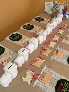 the table is set up with cookies and other items to make it look like they are made out of paper