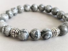 Adjustable Gray Stretch Bracelet For Gift, Gray Adjustable Stretch Bracelet As Gift, Adjustable Gray Stretch Bracelet Gift, Grey Bracelet, Gray Adjustable Stretch Bracelet For Gift, Adjustable Gray Beaded Bracelets With Natural Stones, Silver Agate Stretch Bracelet With Natural Stones, Adjustable Gray Stretch Bracelet With Round Beads, Adjustable Gray Gemstone Beads Bracelets