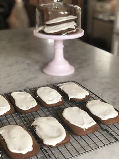 there are cookies with icing on the cooling rack