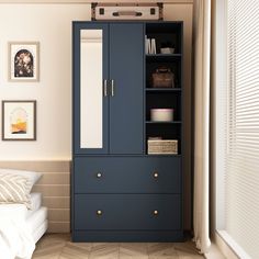 a bedroom with a blue cabinet next to a bed