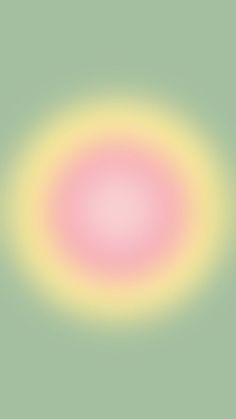 an image of a pink and yellow circle in the middle of a light green background