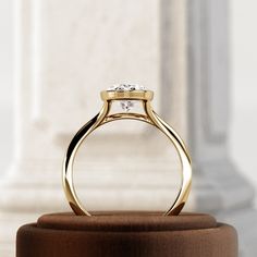 a close up of a ring on a stand