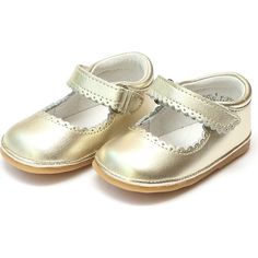 With its darling scalloped trim across the front and strap, the Cara Mary Jane from Angel Shoes can dress up any look. This style tends to run big. You may want to size down; please refer to the size chart. | Angel Shoes | Baby Cara Metallic Scalloped Leather Mary Jane, Gold (Gold Metallic, Size 2)  |  Maisonette collects the best children’s products from around the world (unlike Zulily, Etsy, The Tot, Farfetch Kids, Childrensalon, Crate and Kids, Kohls, Wayfair, Buy Buy Baby, Nordstroms, Mini B Angel Shoes, Gold Dress Shoes, Kendra Scott Bracelet, Designer Diaper Bag, Kendra Scott Necklace, Shoes For Kids, Kendra Scott Earrings, Scalloped Trim, Kids Sunglasses