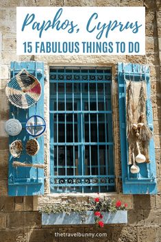 an old building with blue shutters and various items on the window sill that says paphos, cyprus 15 fabulous things to do