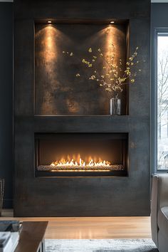 a living room with a fire place in the center and a large window to the side