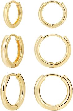 four pairs of gold plated hoop earrings on a white background with clippings