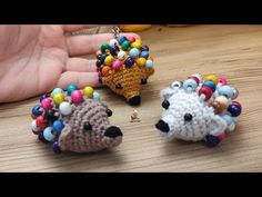 crocheted hedgehog keychains with colorful beads