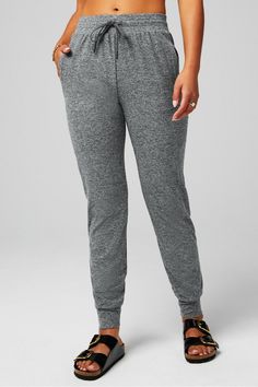 Cloud Jersey Jogger Fabletics Charcoal Grey Heather female Activewear >> Womens >> Bottoms >> Pants & Joggers >> Joggers Cloud Jersey regular Everyday/Lounge Breathable/External Pockets/Moisture-Wicking/UPF Protection Female Activewear, Hidden Pocket, Adjustable Waistband, Recycled Fabric, Active Wear For Women, Jersey Fabric, Bottoms Pants, Charcoal Grey, Moisture Wicking