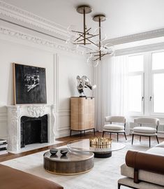 a living room filled with furniture and a fire place