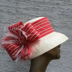 elegant derby wide brim hat made from high quality ivory parasisal with an astonishing coral and ivory decoration and coral feathers. Inspired from Audrey Hepburn style, its wide brim make it really special and suits almost all face types. The hat is hand blocked on a wooden block and hand stitched to perfection at Irina Sardareva millinery atelier. It is great to wear on Derby races, Royal Ascot ,Cocktail parties, Weddings, Tea parties, etc. This hat is in size 22 1/4'' (57 cm) . It can be made with different decoration like Coral. This hat is MADE TO ORDER so give us 7 working days to make it! ♠ COLORS - this hat can be made in Ivory and Navy with different decoration. You can choose it from the menu when you order the hat. ♠ SIZES  - Please check your size before orderFor other sizes we Classic White Summer Top Hat, Chic Cream Boater Hat For Garden Party, Chic Beige Hat For Garden Party, Elegant White Brimmed Panama Hat, Chic Beige Garden Party Hat, Beige Boater Hat For Garden Party, Cream Flat Brim Straw Hat For Garden Party, Cream Boater Hat With Flat Brim For Garden Party, Elegant White Fedora Straw Hat