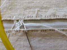 the thread is being used to sew together