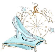 a pair of blue high heels sitting on top of a pillow next to an ornament