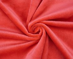 a red fabric is shown in close up