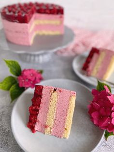 two pieces of cake on plates with flowers